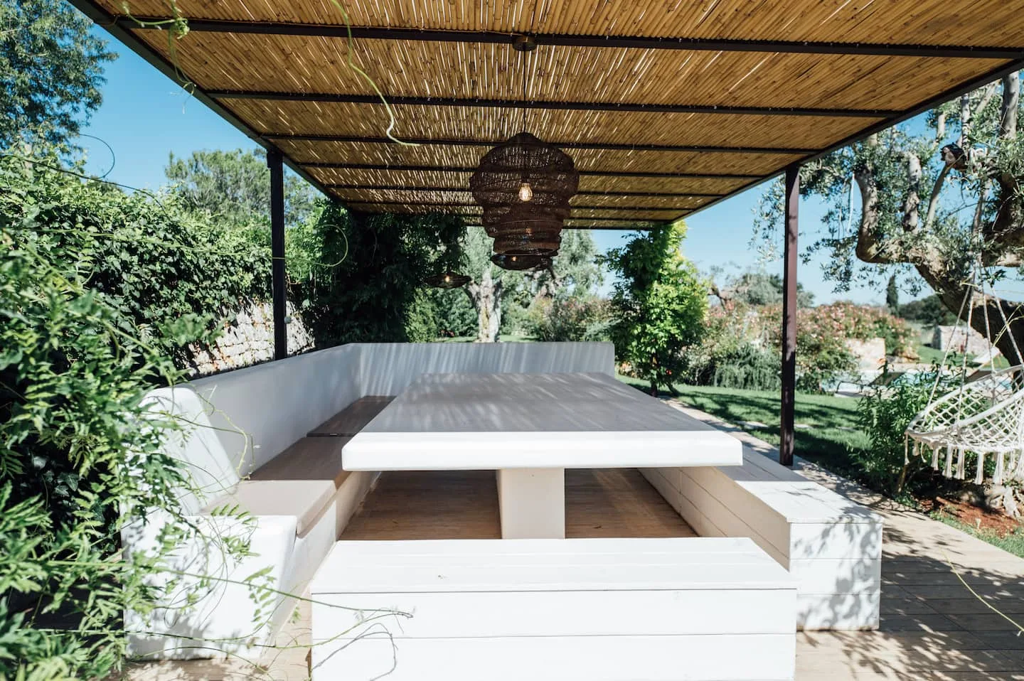 Long shared table outside at a masseria in Puglia