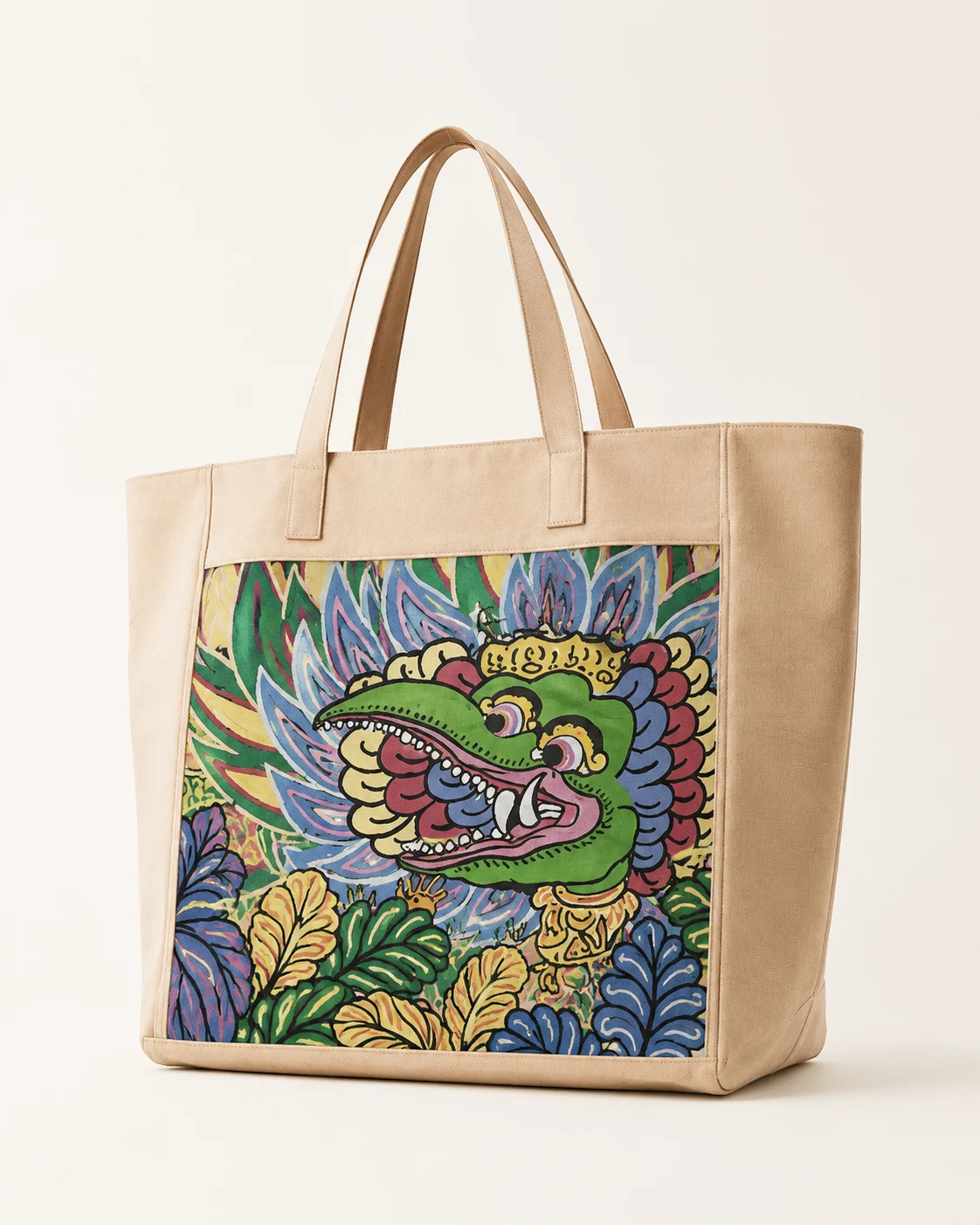 Structured cream tote with green Barong garden artwork presented against a warm neutral backdrop