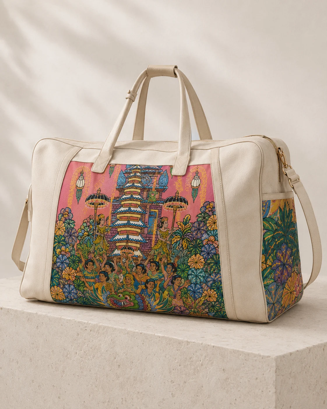 Cream weekender with temple procession and flowering side panels presented on a stone plinth